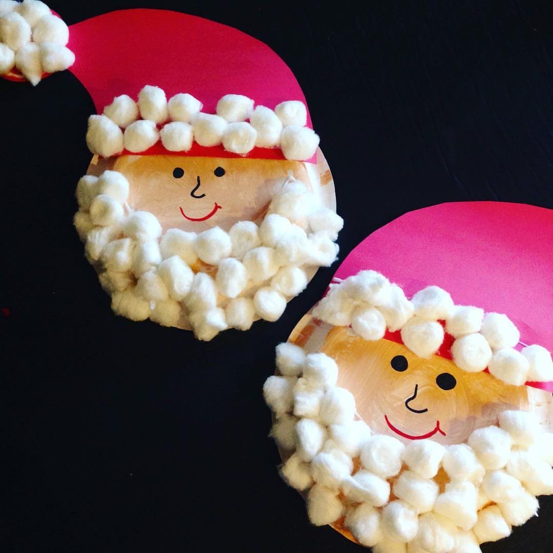 25 Christmas Art and Craft Ideas for Cards, Ornaments, and Decor 20 Two handmade Santa Claus crafts made from paper plates and white cotton balls.