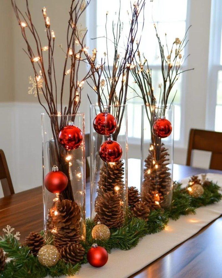 Christmas Decorations with Pinecones: 17 Ideas for Your Home 16 Christmas table decorations featuring pinecones in glass vases, red ornaments, and a green garland.