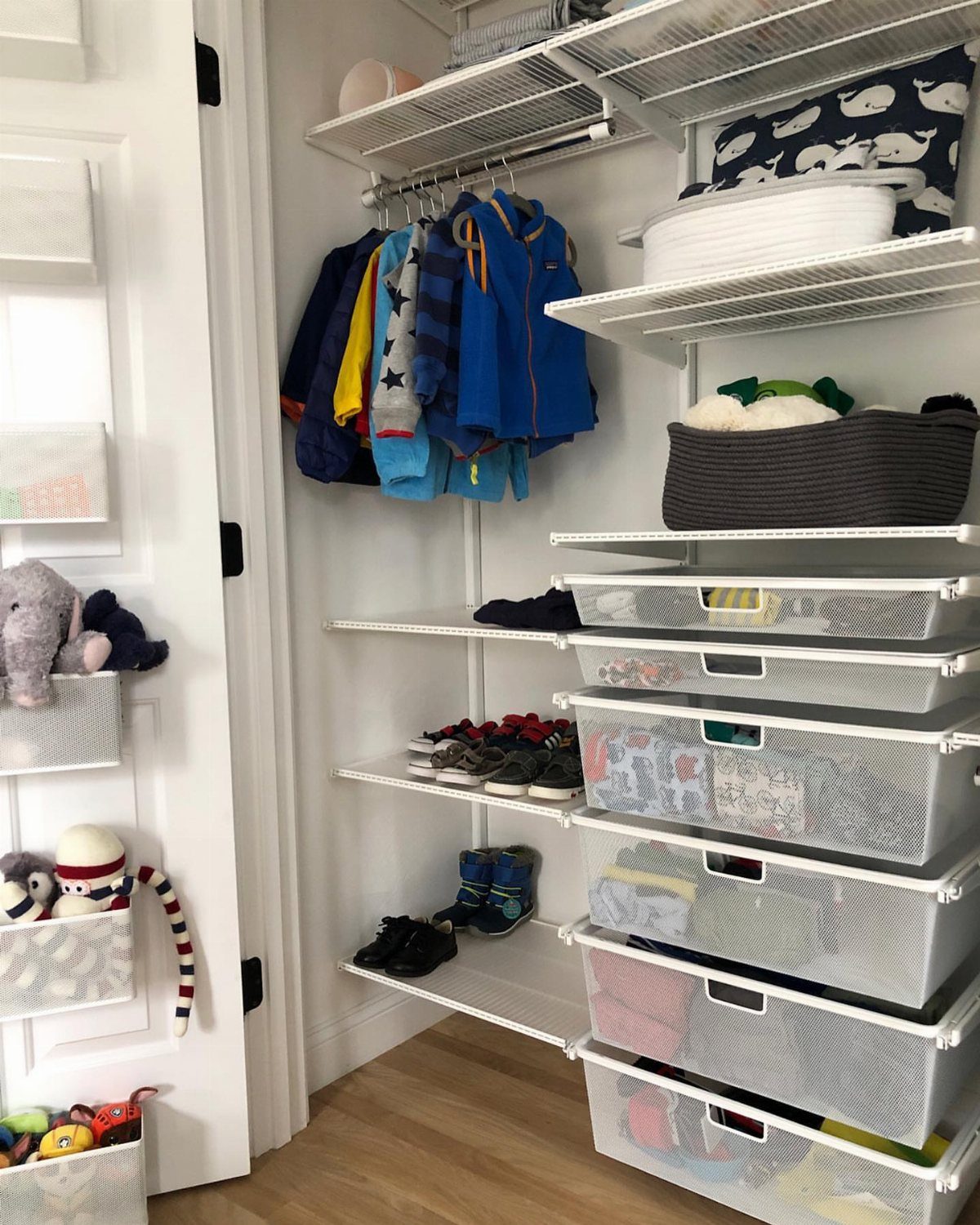 5 DIY Closet Upgrade Ideas Using Popular Wall and Modular Systems 4 White wire closet organization system with hanging clothes, mesh drawers, and shelving in a small closet.