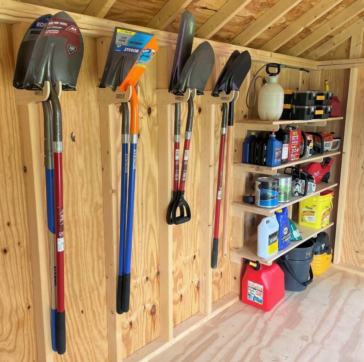 Garden Shed Design: 7 Ways to Use the Space You Have 6 Garden tools hanging on wooden walls next to shelves filled with various containers and equipment.