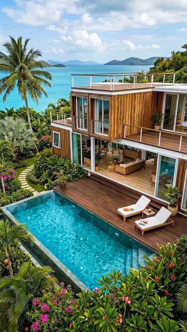 20 Patio and Deck Ideas to Make Your Yard Feel Like a Room 1 A multi-level wooden tropical villa with decks overlooking a blue ocean and swimming pool.