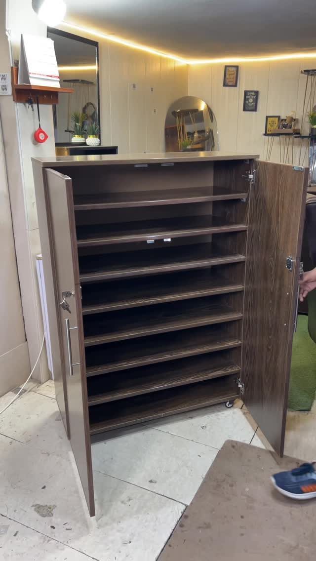 Shoe Storage Tall Cabinet: 6 Ideas for Hallways and Closets 1 Open dark wood shoe storage cabinet with multiple empty shelves inside a room.