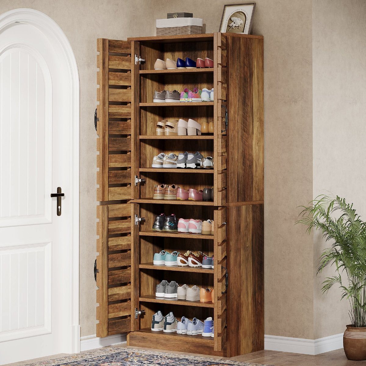 Shoe Storage Tall Cabinet: 6 Ideas for Hallways and Closets 2 Tall wooden four-door shoe storage cabinet filled with many pairs of shoes in a room.